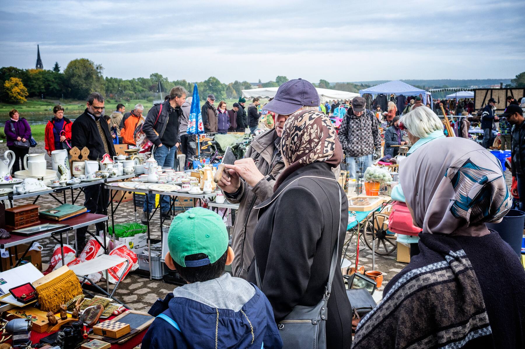 Crowds browsing the flea market stalls