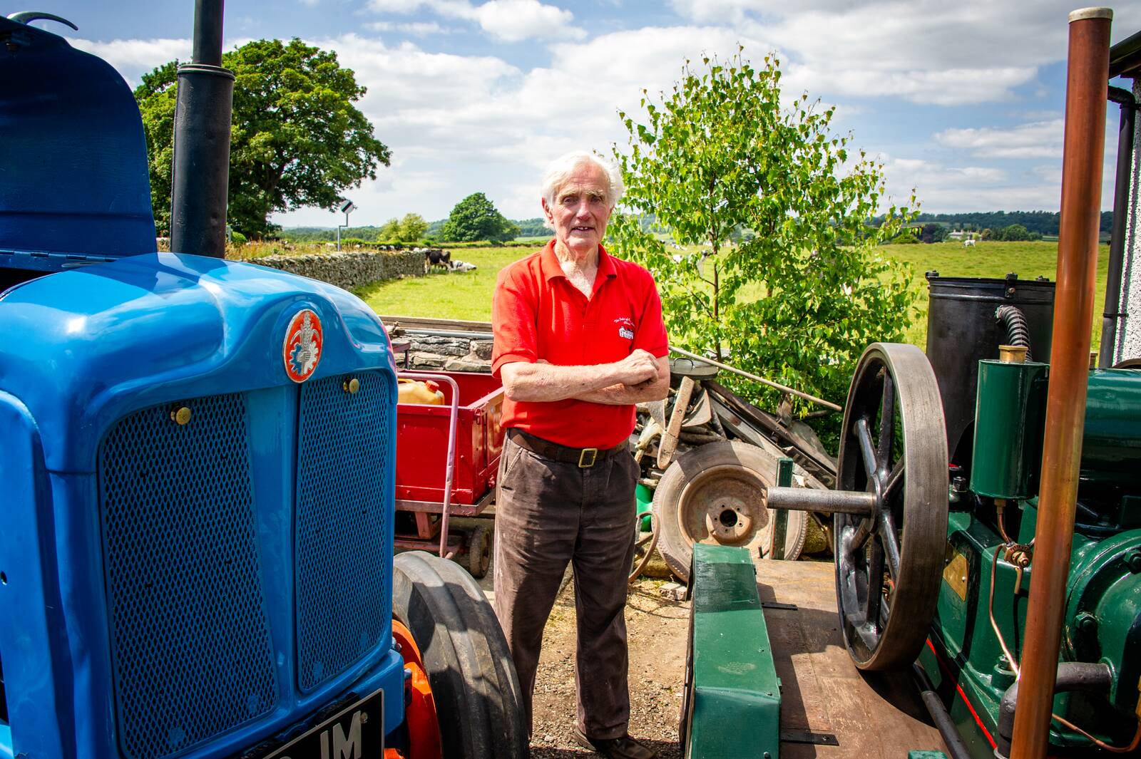 Bill standing with his machinery