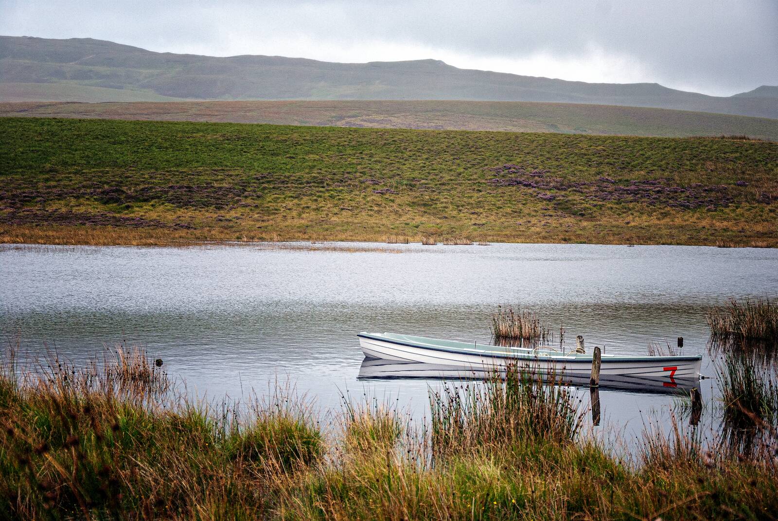 Boats on a still loch