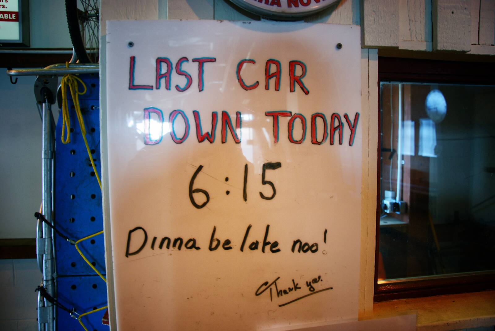 Whiteboard sign — last car down 6:15