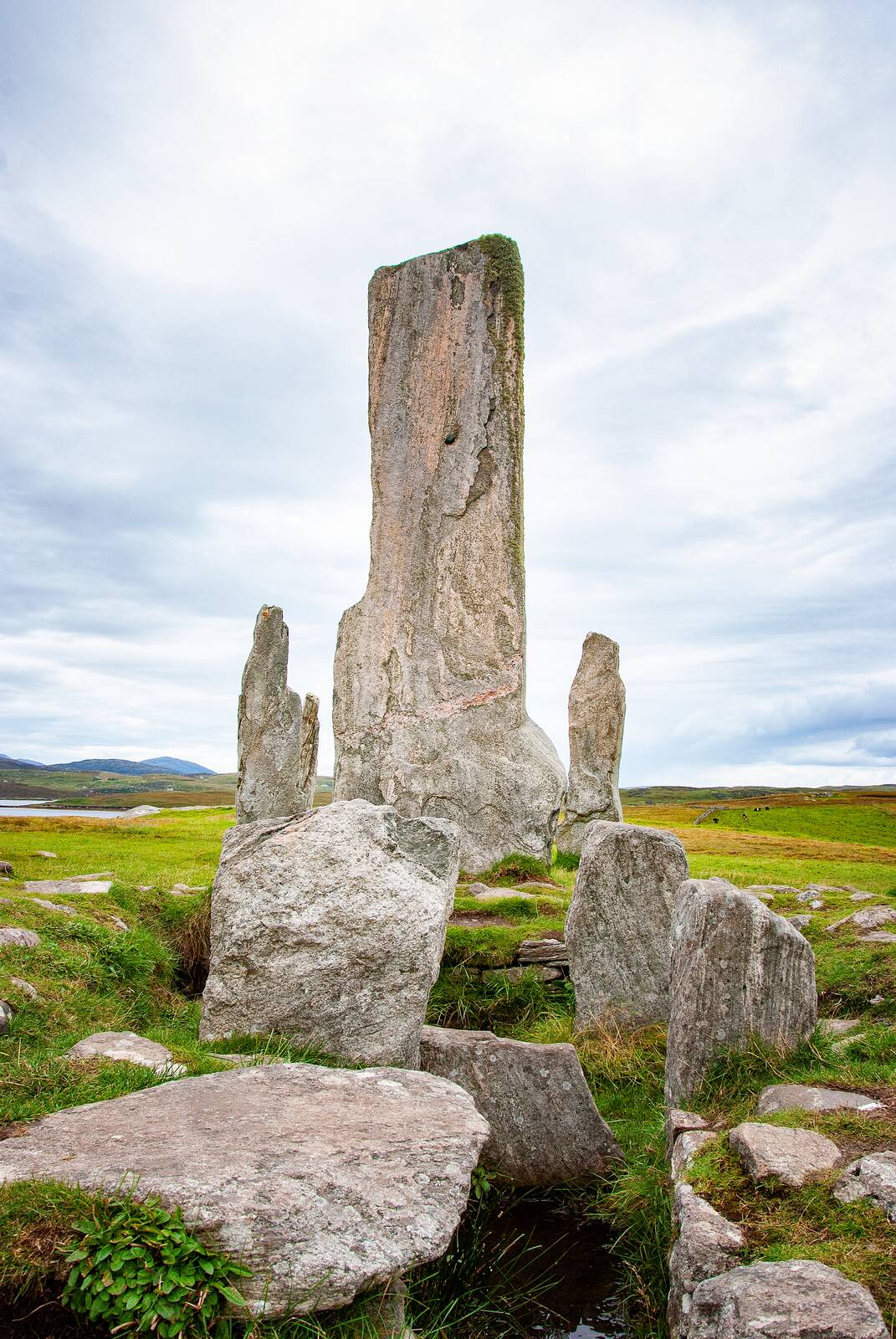 Small standing stones among boulders
